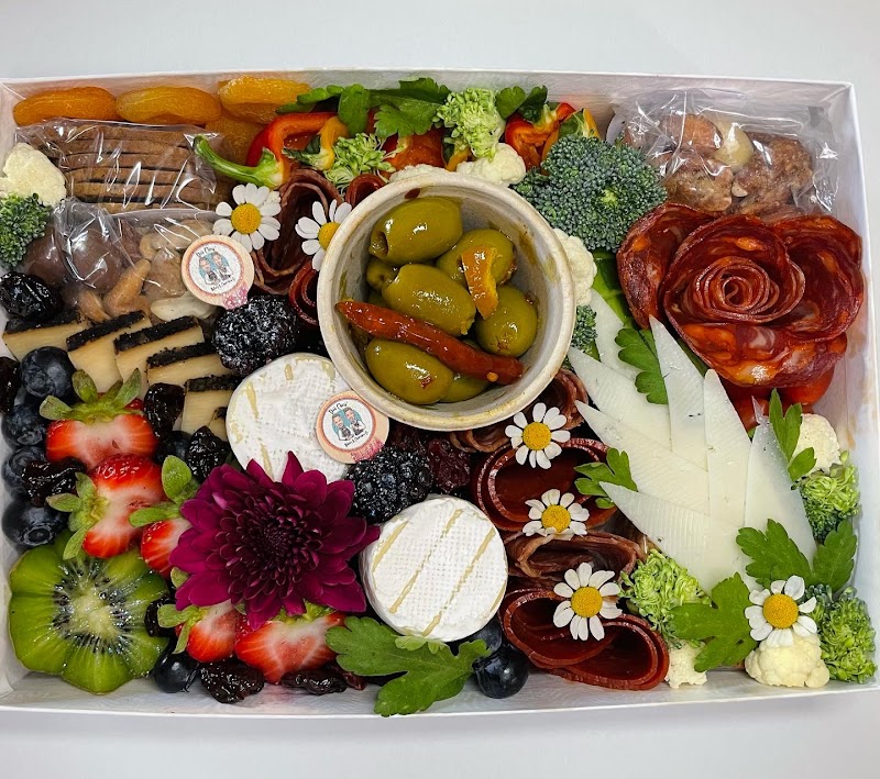 Dos Chris’ Bakery & Charcuterie Co. cover image